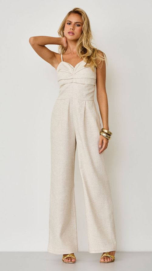 MACACÃO DE LINHO COM PREGAS